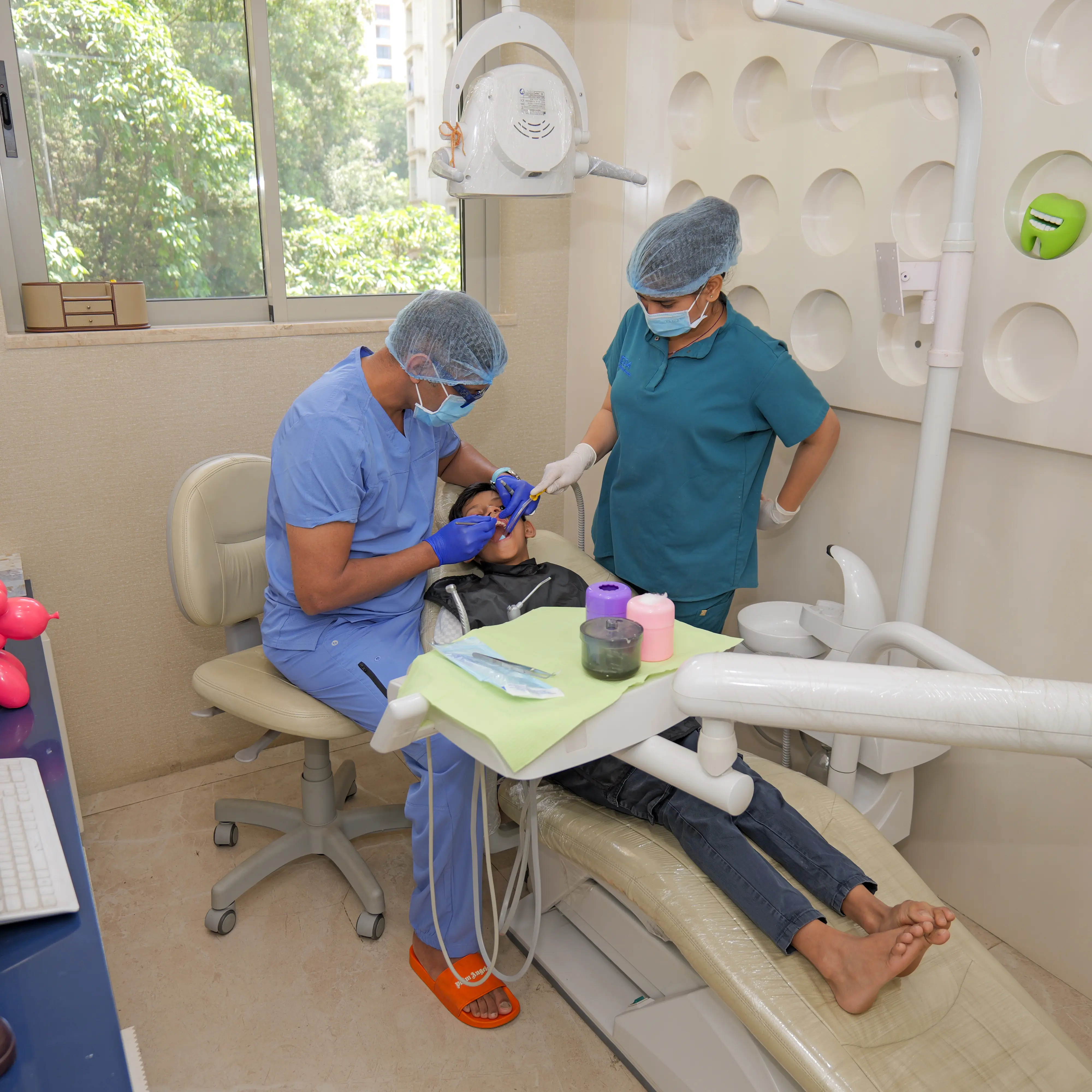 painless dental treatment in Powai Mumbai by experienced dentist at Hiranandani clinic
